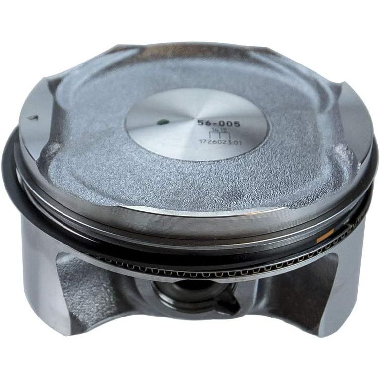 Gray metallic piston assembly with smooth top, engraved markings, and black piston rings.