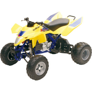 Suzuki ATV Quadracer R450 1:12 scale by New Ray Toys in black and yellow, featuring large tires, a black seat, and prominent front suspension, shown from an angle on a white background.