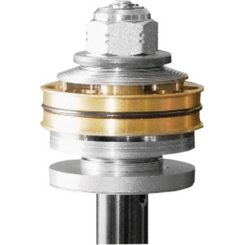 Close-up view of the Race Tech Shock Rebound Separator Valve, showing gold and silver circular components stacked vertically around a central shaft.