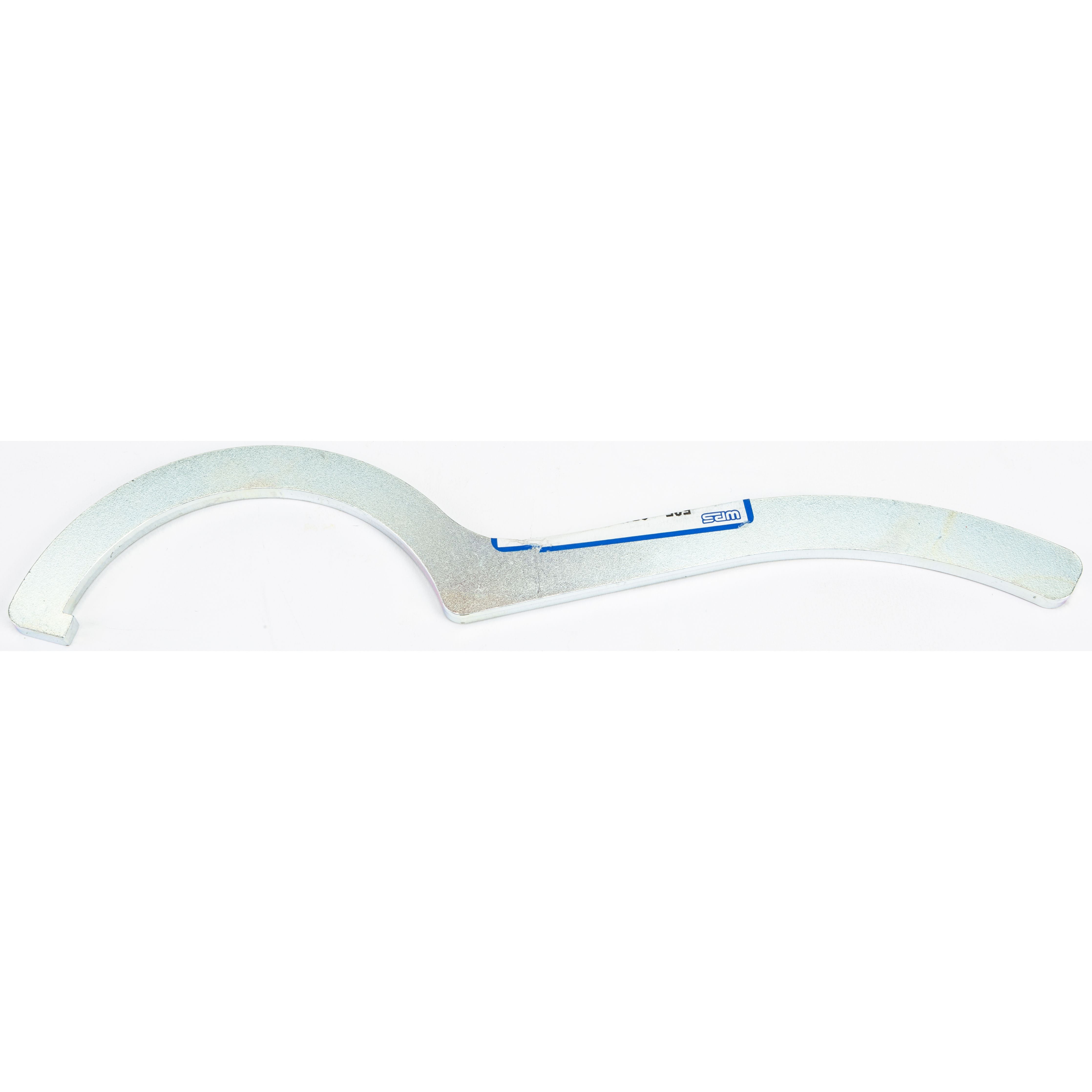The Shock Spanner Wrench 3.60 by Fox is a silver, curved metal tool with a hooked end for tightening or loosening UTV shock round nuts; it features a small blue and white label attached.
