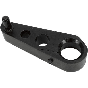 The Yamaha Front Chain Slider by Moose Offroad is a black metal part made in the USA, featuring a cylindrical peg, two central circular holes, and a large rounded opening for easy installation on Yamaha Blaster, Warrior, Raptor, or Banshee.