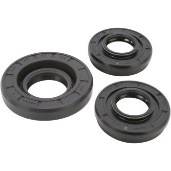 Three black seals from the Honda Differential Seal Kit Front by Moose Offroad are arranged on a white background, each with a circular shape and ridged edges, designed for use in high-speed EMQ bearings or differential service kits.