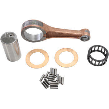 The Honda Connecting Rod Kit by Hot Rods includes an OE replacement connecting rod made of 8620 AISI steel, bronze rod, cylindrical pin, caged needle roller bearing, washers, and loose needle bearings—displayed on a white background.