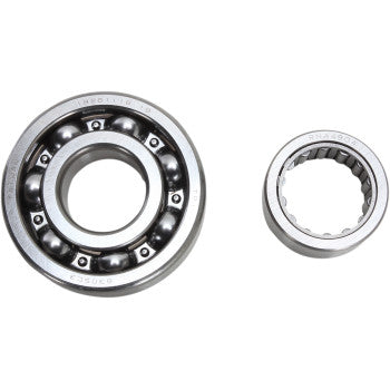 The image shows two types of metal bearings: a Hot Rods ball bearing on the left, and a cylindrical roller bearing on the right, both featured in the Yamaha Counter Balancer Kit by Hot Rods for 4-stroke engines with a counter balancer shaft.