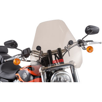 A motorcycle viewed from the front features a 15 tinted S-06 Windshield by Slipstreamer, black handlebars with rearview mirrors, orange turn signals, and a prominent headlight.