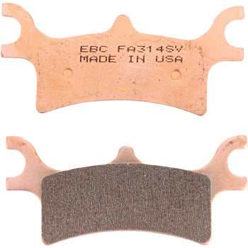 Two copper-colored SV Severe Duty Brake Pads by Ebc are shown—one displays the metal backing stamped with EBC FA314SV MADE IN USA, while the other reveals the friction material. They're ideal for utility use and designed for ultra-long pad life.