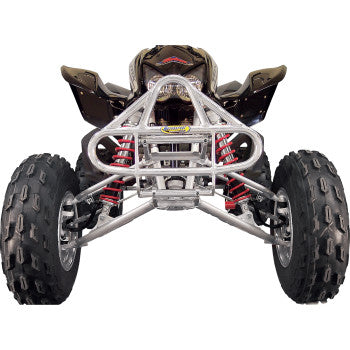 Front view of an ATV with large rugged tires, red coil shocks, and the EZ Fit Bumper Desert Silver by Motorsport Products—a sturdy, silver bumper compatible with many ATV models.