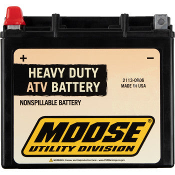 Black and beige rectangular AGM ATV battery with red positive terminal cap and Moose Utility Division logo.