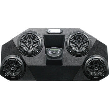 The Polaris Audio Mini by Hoppe Industries features a black, geometric, textured panel with four Kicker speakers at the corners and a central control unit with Bluetooth buttons and display.