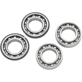 Four metal bearings from the Polaris Counter Balancer Bearing Kit by Hot Rods are shown on a white background. Each features outer and inner rings with evenly spaced ball bearings within the circular frames.