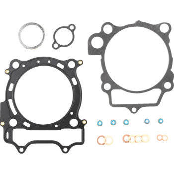 The Yamaha Top End Gasket Kit 95 mm by Cometic includes assorted gaskets, washers, and MLS head gaskets with Extreme Sealing Technology for reliable engine assembly, all arranged on a white background.