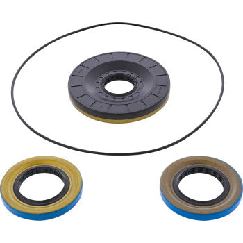 The Can Am Differential Seal Kit Rear by Moose Offroad includes three circular TC rubber seals and one thin O-ring in black, yellow, and blue—each with a central opening and ridged edges—perfect for high-speed bearings on a white background.