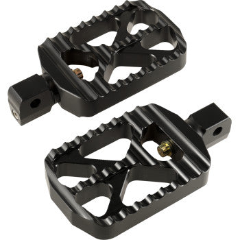 A pair of black, rectangular Indian Bear Claw Footpegs by Joker Machine featuring ridged, jagged edges and an open cutout design for enhanced grip.