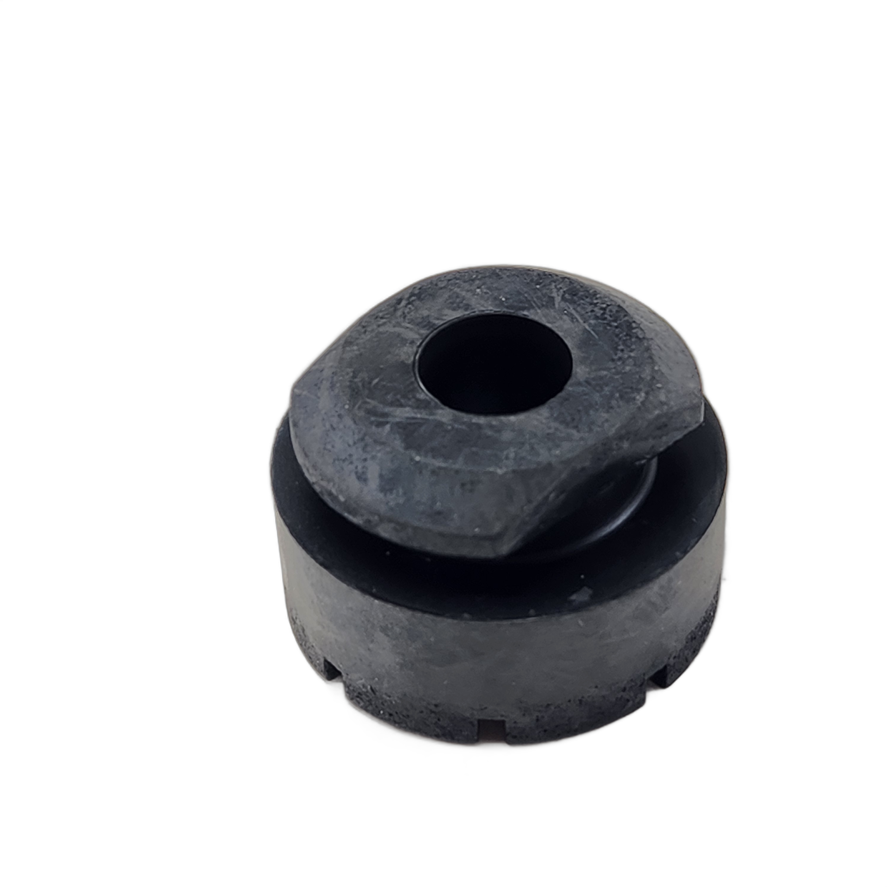 The Rubber Sleeve Seat by CF Moto (OEM 7020-130001) is a small, round black rubber grommet with a central hole and beveled edge—ideal for UTV seat replacements. Shown on a plain white background.
