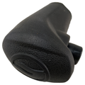 Black textured plastic gear shift lever knob with ergonomic curved design and embossed logo on top.