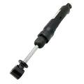 Black and silver front shock absorber with mounting eyelets for Polaris ATV suspension.