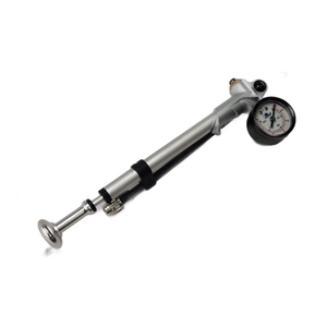 The Pump-Shock Fox Float by Polaris is a silver handheld air pump with a built-in pressure gauge, black accents, and a metal piston, ideal for shock adjustment, shown on a white background.