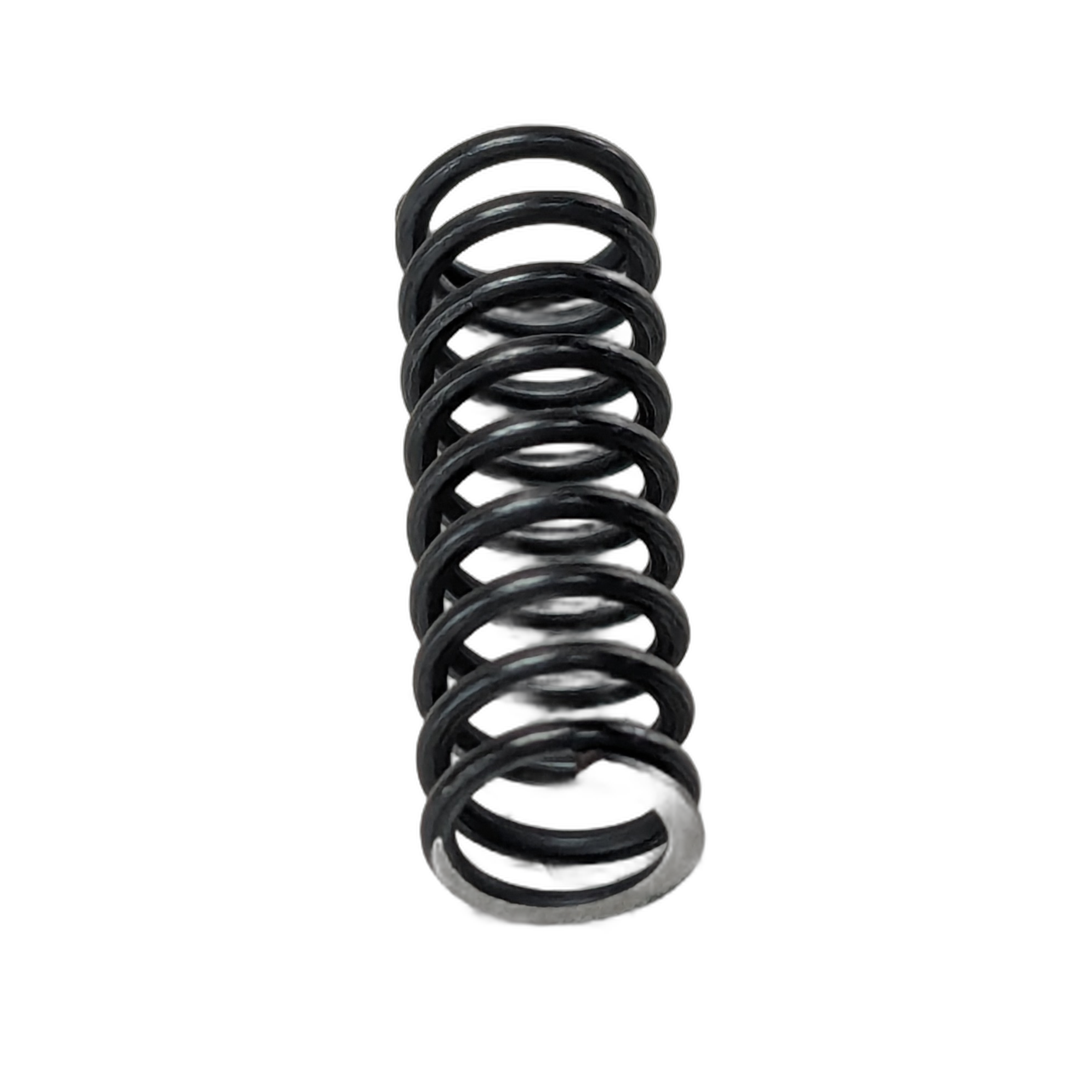 Black metal coil pressure relief spring with consistent round coils, designed for offroad vehicle suspension.