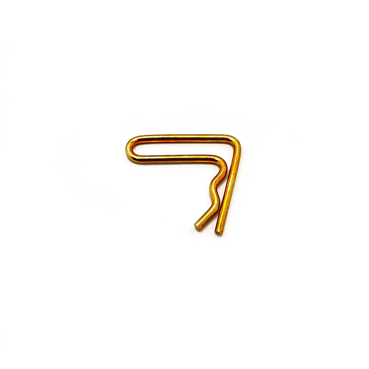 Gold-colored metal spring tailgate latch clip with curved and angled design.
