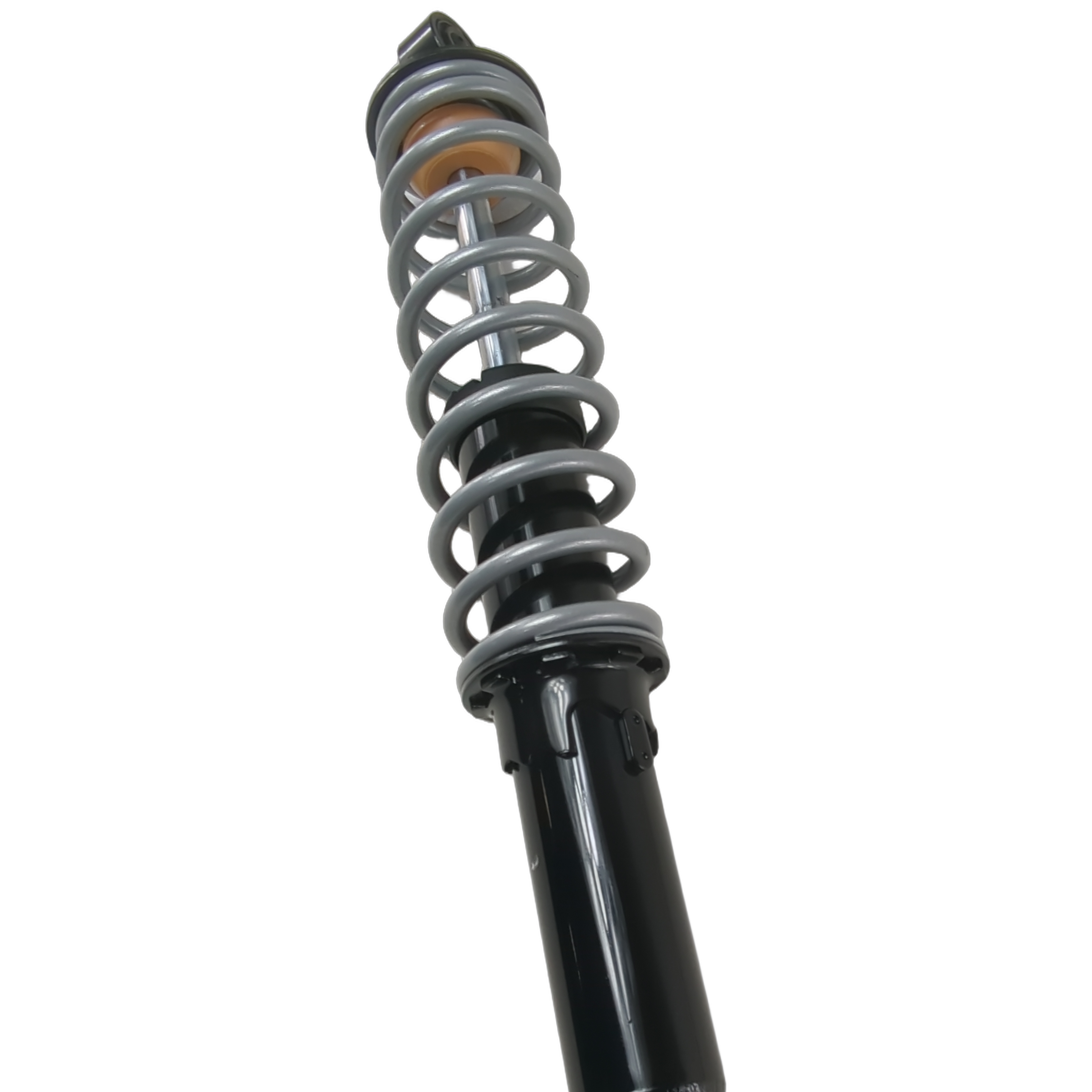 Polaris front shock absorber in turbo silver with black lower mount and coiled metal spring.