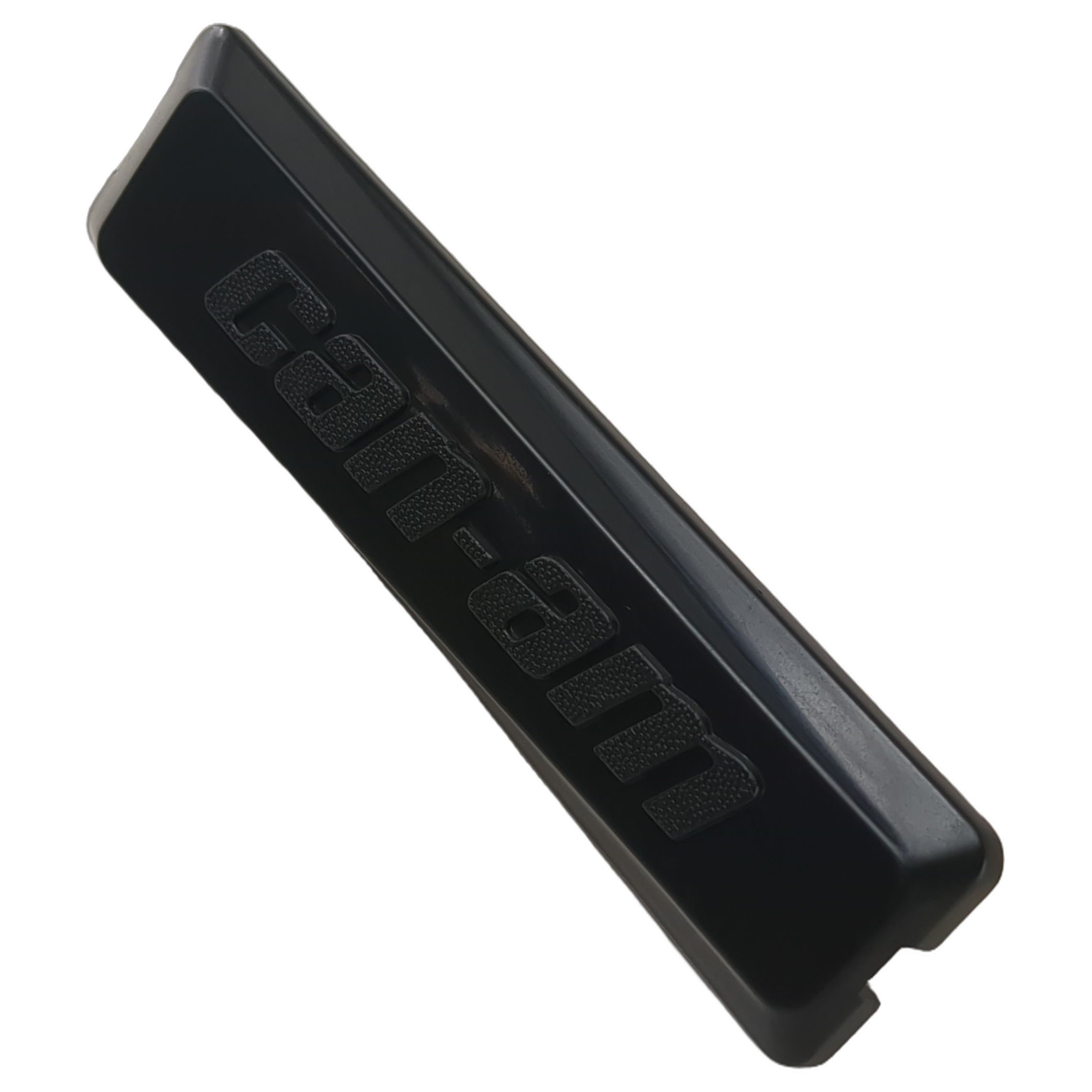 Black plastic left mirror cover with embossed Can-Am logo and smooth angled surface.