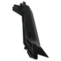 Deep black plastic front headlight trim with angular, aerodynamic shape and mounting clips.