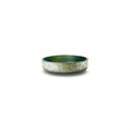 Round metal expansion plug with silver exterior and smooth green interior coating.