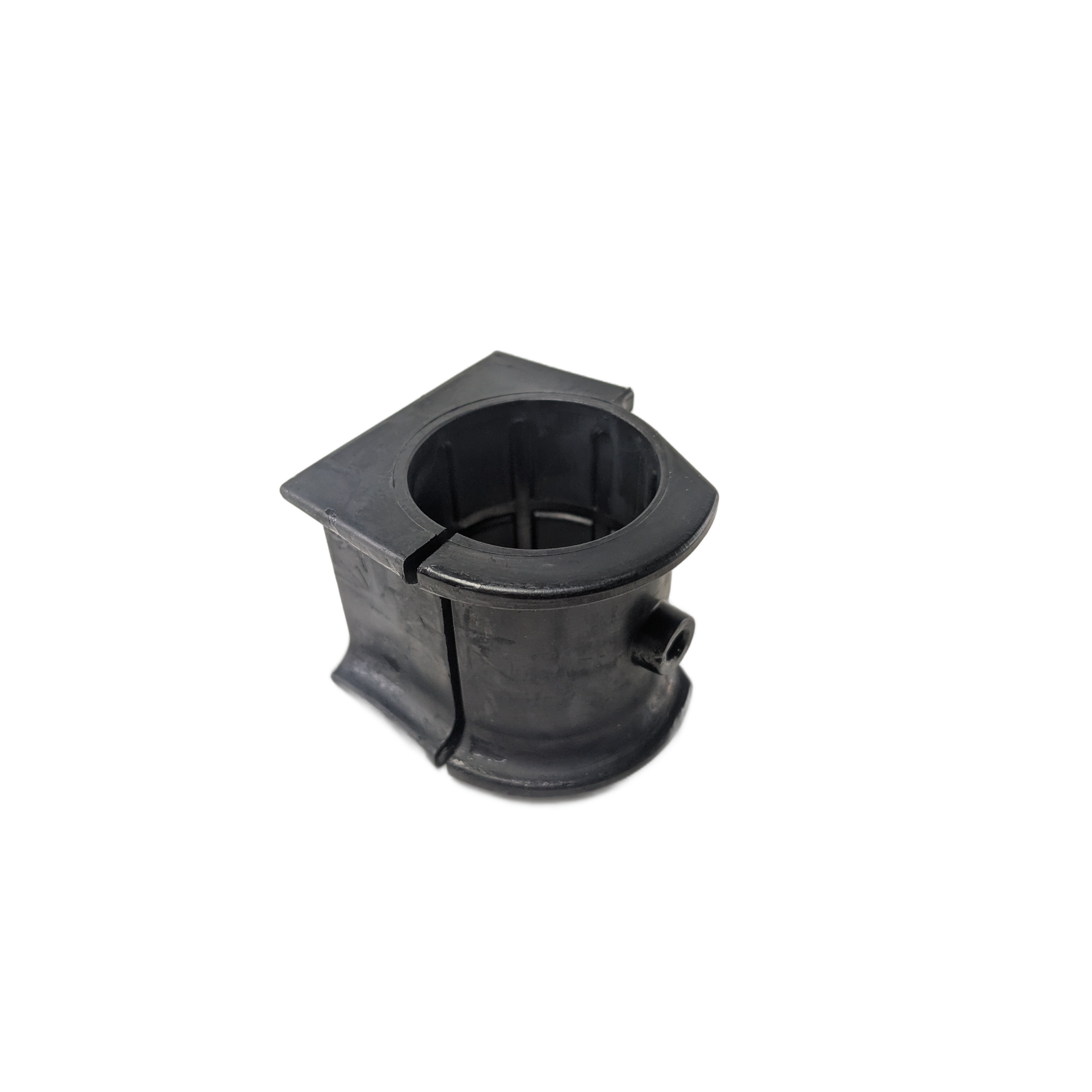 Black cylindrical rubber stabilizer bar bushing with a split design and rectangular flange base.