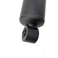 Matte black cylindrical front shock absorber with rubber bushing and metal mounting eyelet.