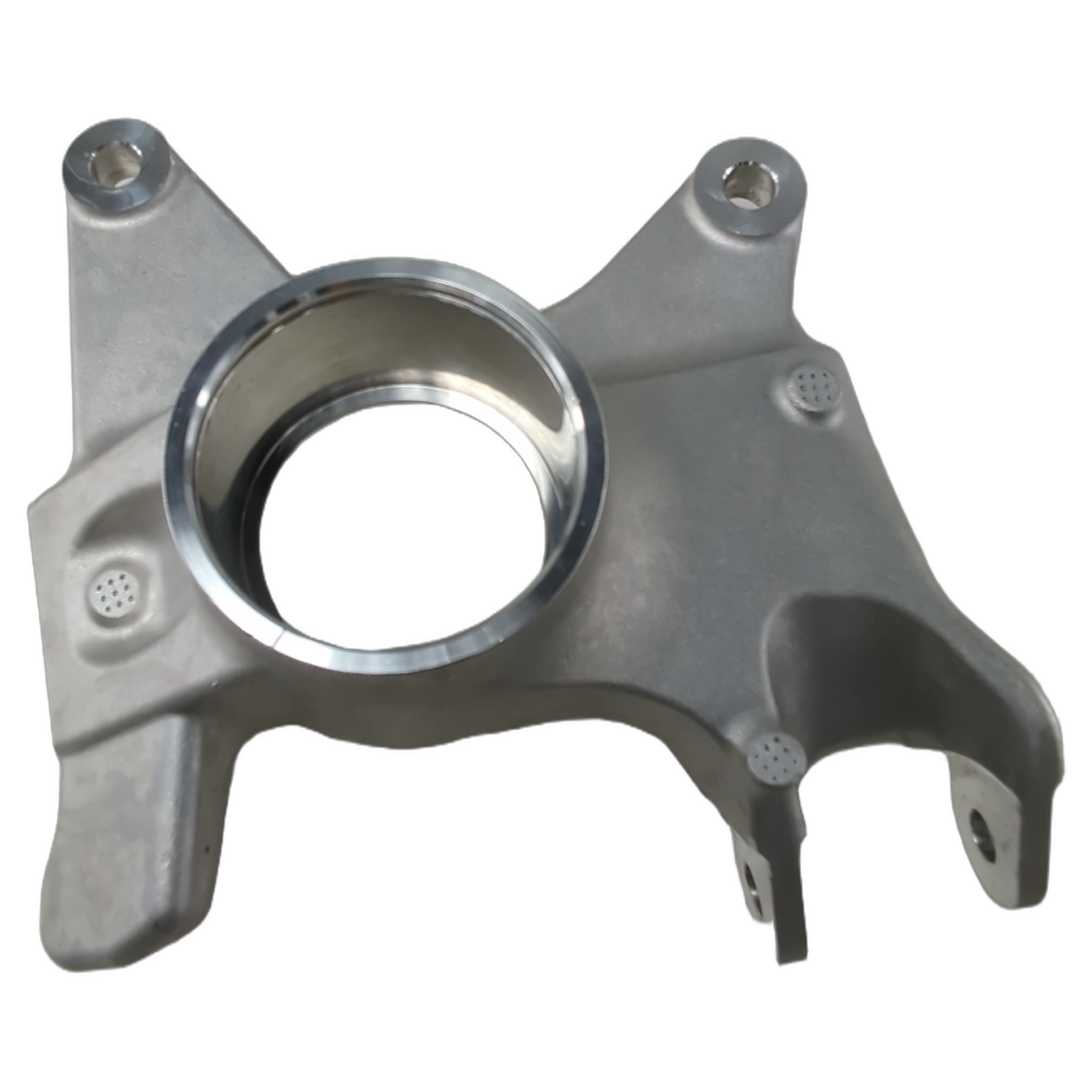 Silver metallic front steering knuckle for left side with circular bearing housing and mounting points.