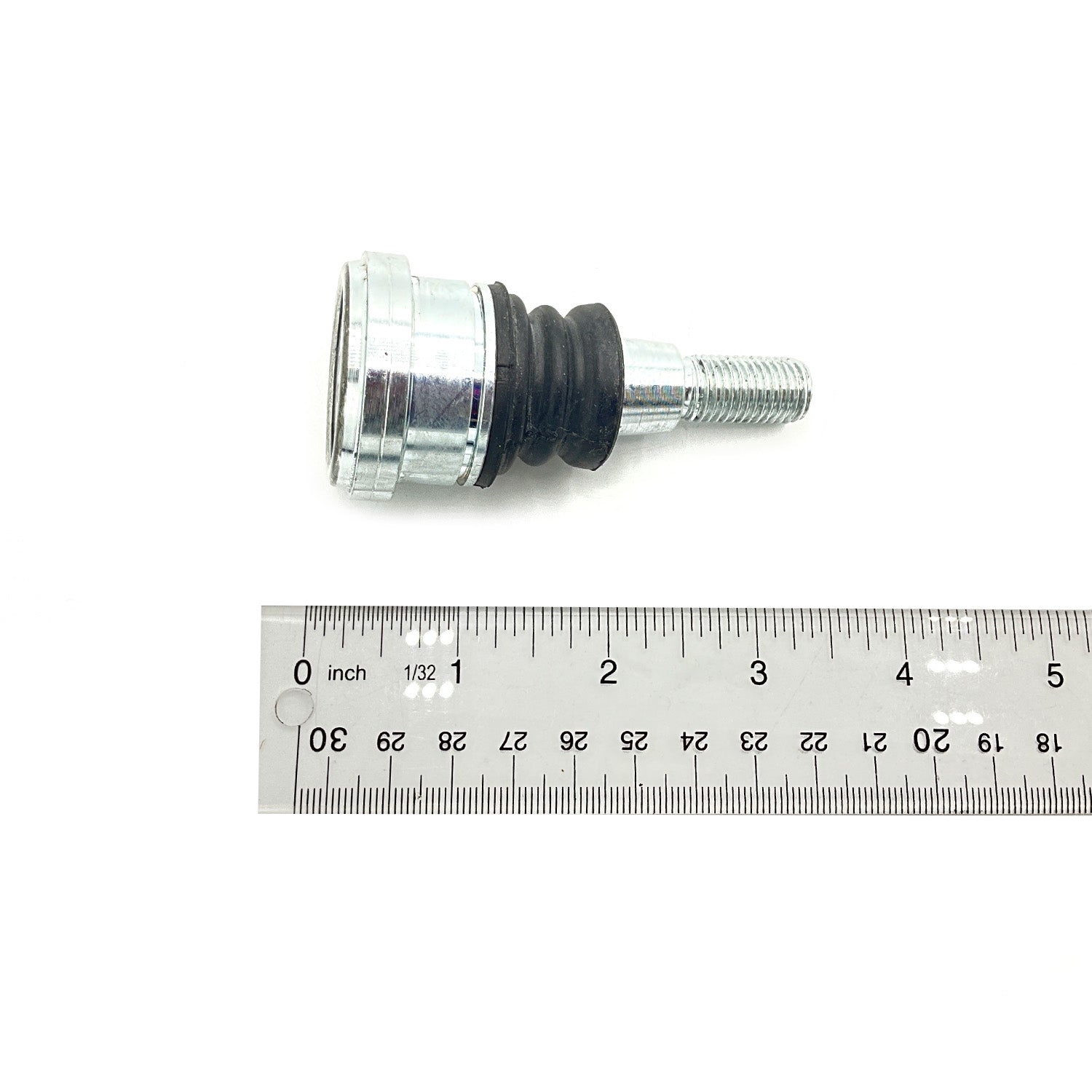 Metal ball joint with threaded bolt and black rubber boot, next to a metal ruler showing length.