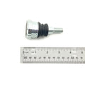 Metal ball joint with threaded bolt and black rubber boot, next to a metal ruler showing length.