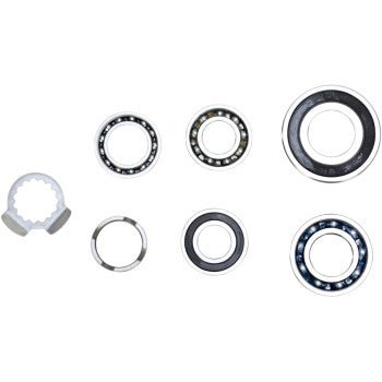 The Transmission Bearing Kit by Hot Rods features seven assorted bearings and retaining rings in various sizes and designs, perfect for transmission repair or engine case installation, shown on a white background.