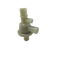 Beige plastic thermostat housing with three cylindrical connectors and rounded base.