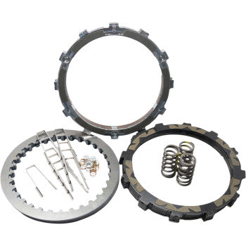The RadiusX Clutch by Rekluse, shown on a white background, includes clutch plates, springs, small metal pins and rings, and features a TorqDrive friction disc.