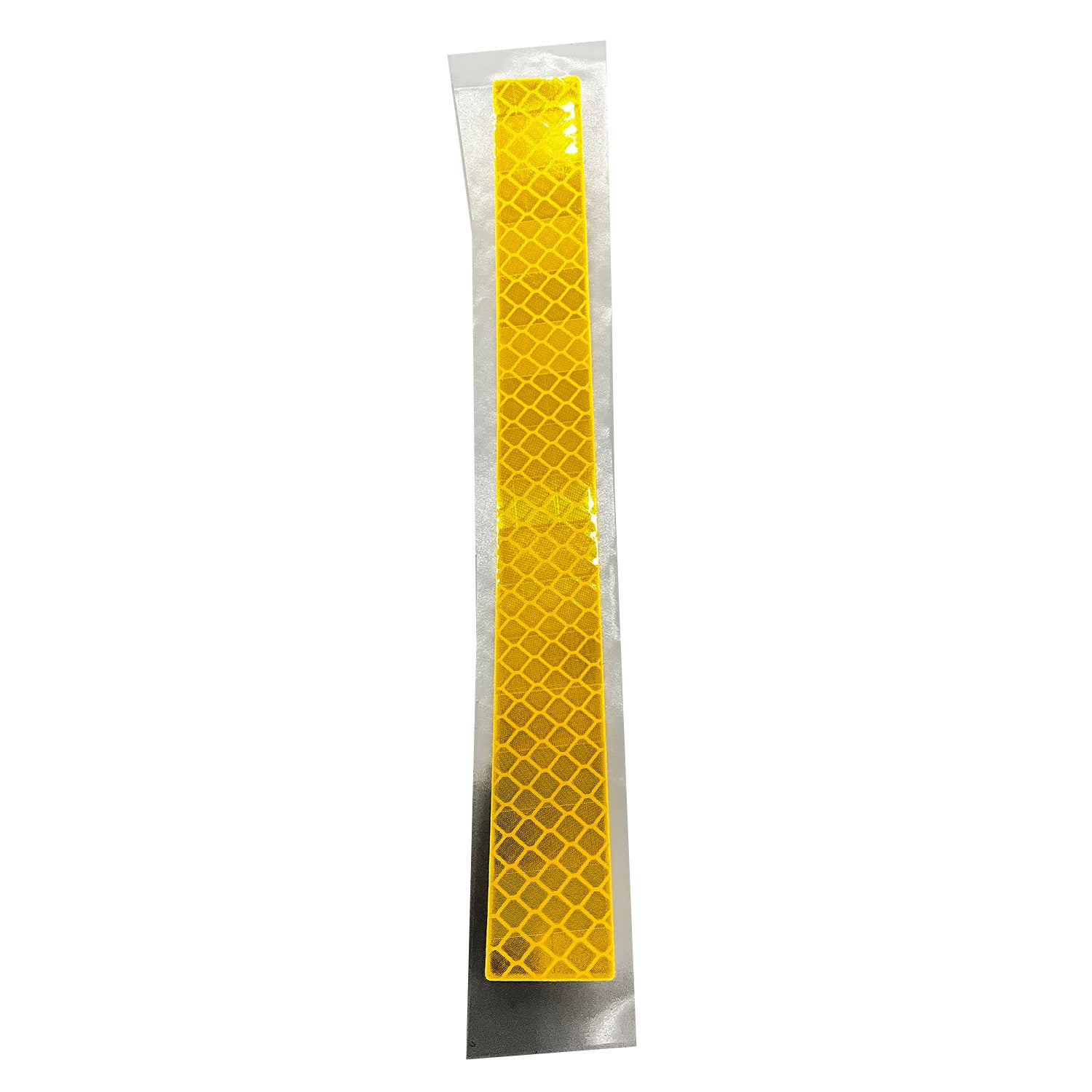 Long narrow amber reflector decal with honeycomb pattern on clear adhesive backing.