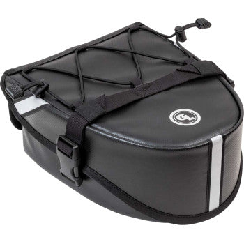 The Klamath Tail Rack Pack™ Black by Giant Loop is a black and gray bike seat bag with reflective strips, adjustable straps, and a bungee cord net—ideal as soft luggage for adventure touring or as a compact motorcycle tail bag.
