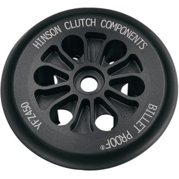 A black, circular Pressure Plate by Hinson Racing, CNC-machined from aircraft-grade aluminum with multiple openings and "Hinson Clutch Components," "Billet Proof," and "YZ450" printed in white around the edge.