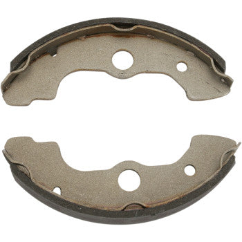 Brake Shoes by Dp Brakes feature two curved, sintered-metal pads with notched edges and central holes for durable, fade-free performance—an ideal replacement option for vehicle drum brake systems.