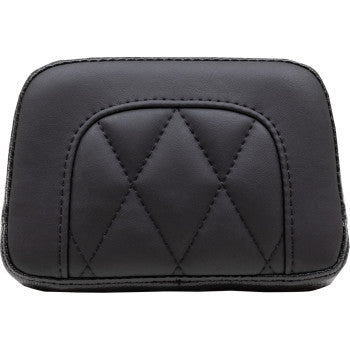 The Touring Sissy Bar Pad - Standard - Black - Diamond Stitch by Mustang is a small, rectangular black leather pad featuring diamond-shaped stitching and a slightly curved front seam, reminiscent of a motorcycle seat.