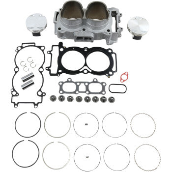 Silver metal Polaris cylinder with two piston chambers, two pistons, multiple gaskets, and circular piston rings arranged.
