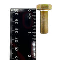 Gold-colored hex bolt with fully threaded shaft next to a black ruler showing about 1 inch length.