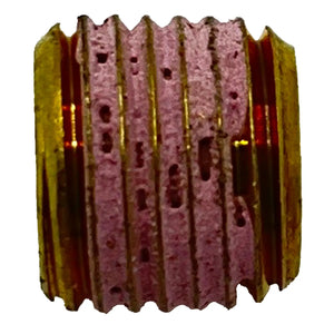 Brass hex socket plug with pink thread sealant on external threads.