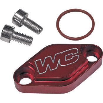The Block Off Plate Red by Works Connection is shown on a white background, featuring a red metal plate with engraved letters, two silver screws, and a brown O-ring—parts commonly used in ATV sport quad parking brake assemblies.