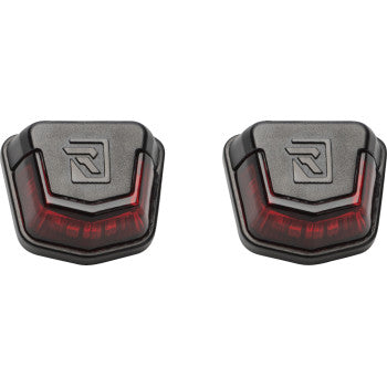Pair of black angular UTV trunk bed lights with red translucent accents and embossed R logo.