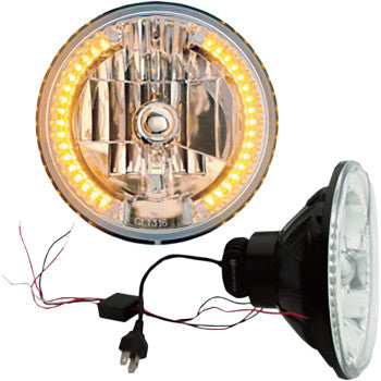Two 7 LED Headlights with LED Turn Signals by Headwinds, featuring reflective interiors, yellow ring lights, attached wires, and plug. One headlight is shown facing forward; the other reveals the side and rear wiring.