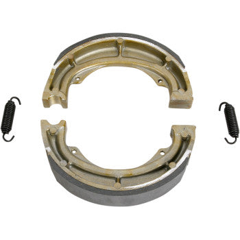 Brake Shoes by Ebc: Two semi-circular radius-ground shoes with curved friction surfaces form a near-complete circle, each paired with original-style brake shoe springs on either side.