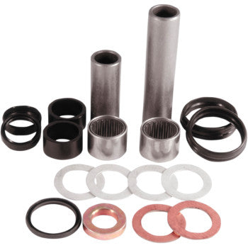 The Swingarm Repair Kit by Epi includes OEM quality cylindrical metal bushings, needle bearings, O-rings, and flat washers in assorted sizes, all arranged on a white background.