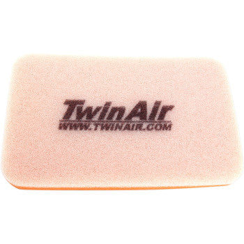 The Polaris Standard Air Filter by Twin Air is a rectangular, light pink dirt bike filter with dual-stage filtration and features "TwinAir" and "www.twinair.com" in black text on its surface.
