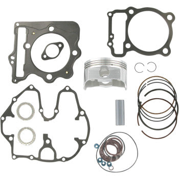 The Honda Piston Kit with Gaskets 89.00 mm by Wiseco includes pistons, gaskets, piston rings, circlips, a wrist pin, and small seals neatly arranged on a white background.